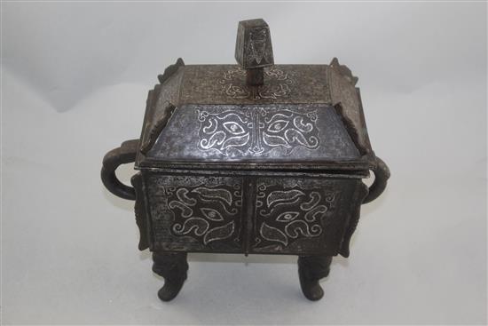 A Chinese iron and silver overlaid vessel and cover, Fangding, probably 19th century, 27.5cm